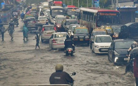 Mumbai Faces Waterlogging and Traffic Amid Heavy Rain; Orange Alert Issued